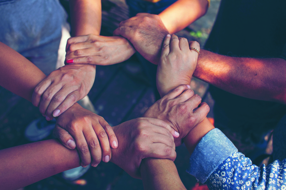 High Angle View Friends Making Chain
