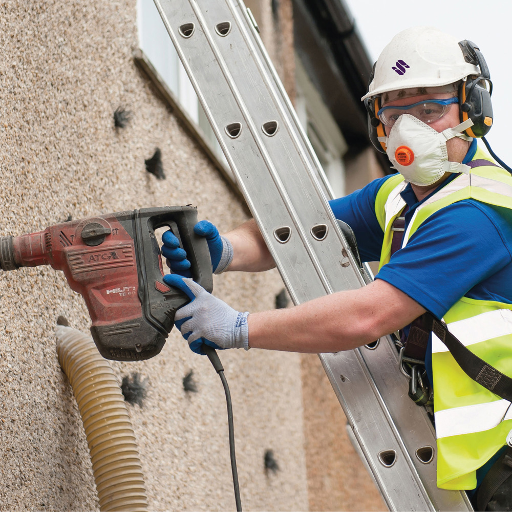 Cavity Engineer Working On Ladder
