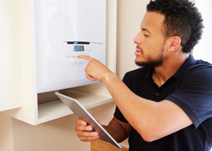 Engineer doing service on boiler