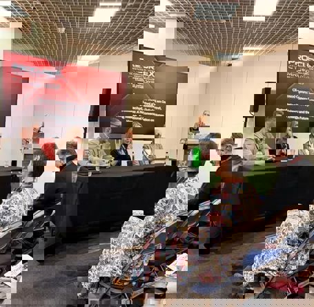 Speakers sat at table 