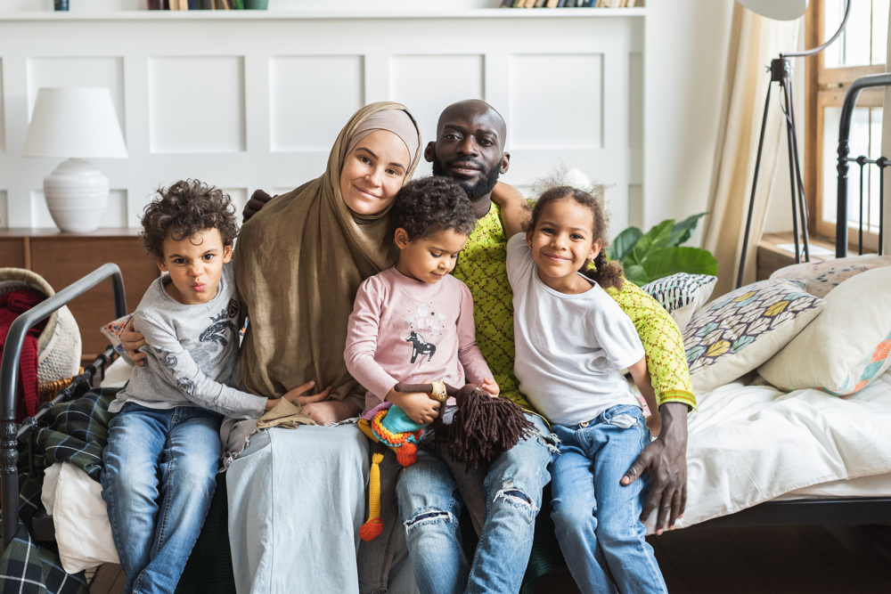 Cute Kids With Father Sitting Home