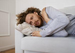 Man Unwell Lying Down