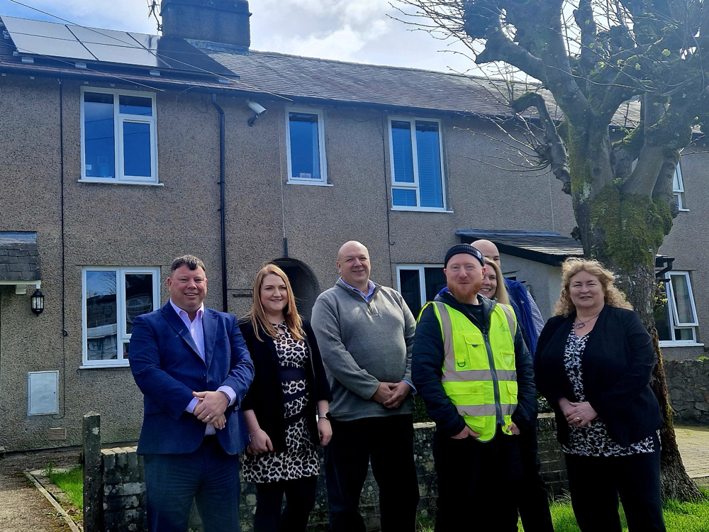 Residents stood outside a South Lakes Home