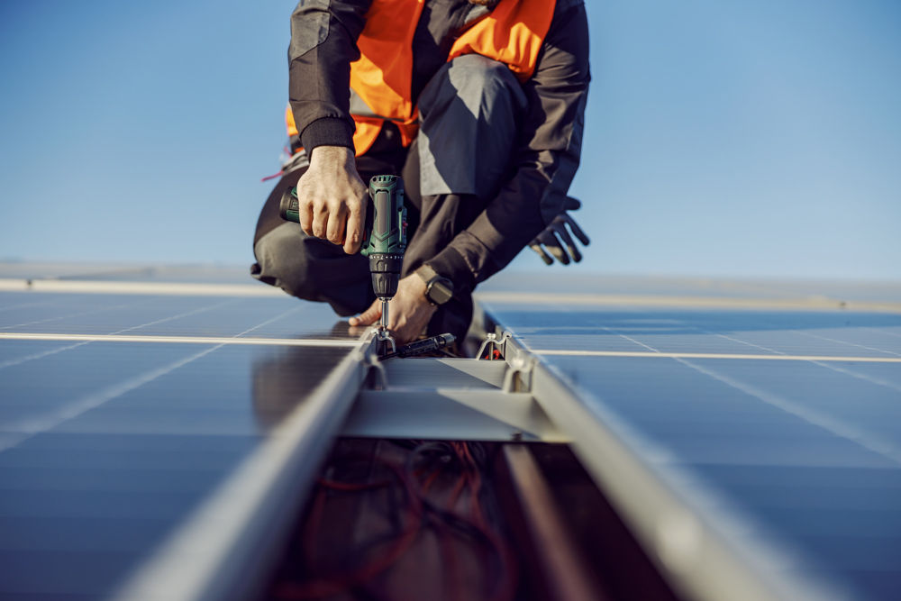 Close Up Installing Solar Panel Roof